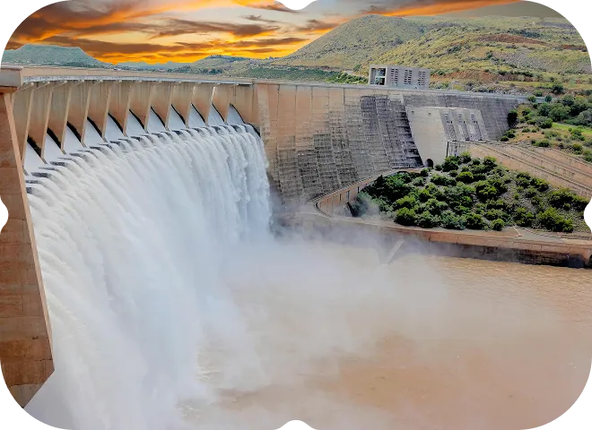 A picture of a large waterfall with water coming out of it.