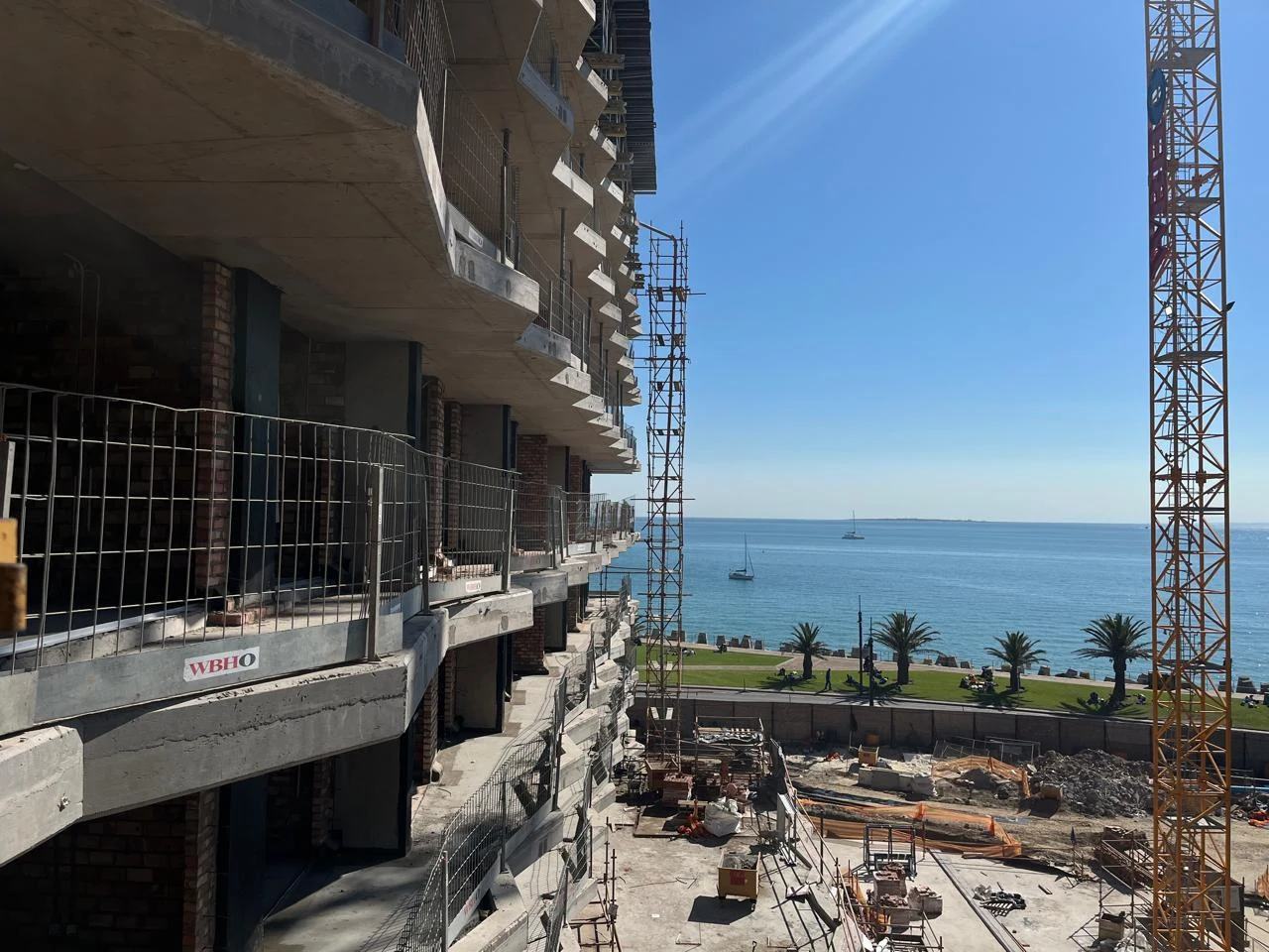 High-rise residential building under construction overlooking the Cape Town waterfront