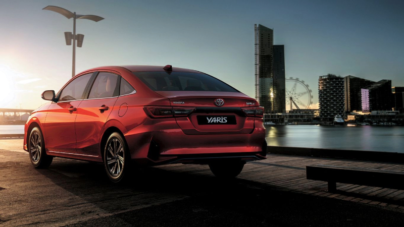 Rear view of red Toyota Yaris