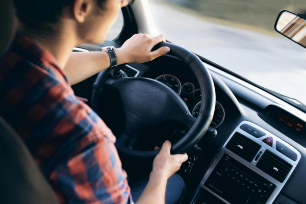 Man driving a vehicle