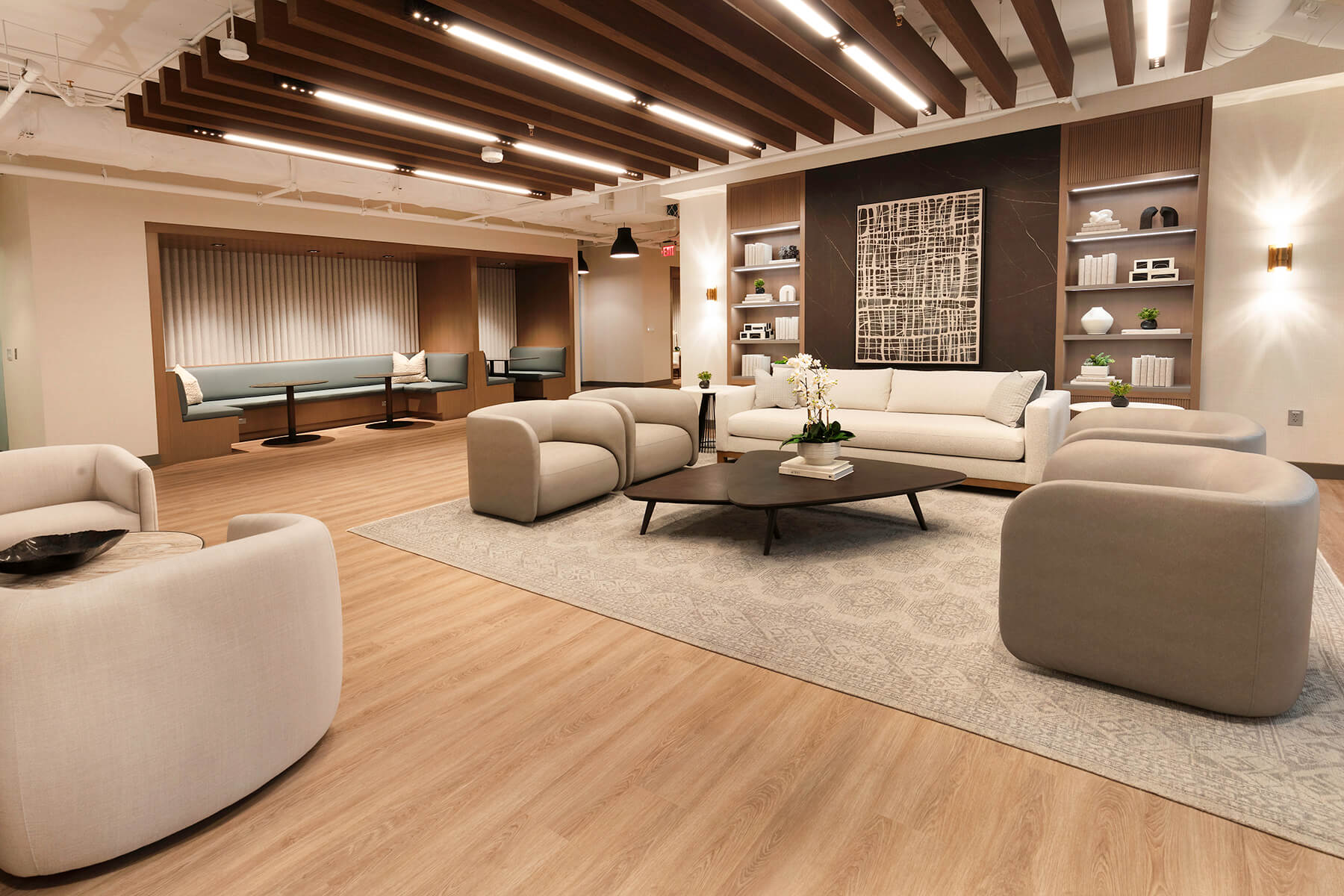 Interior view of the lobby with couch seating and wood ceiling.