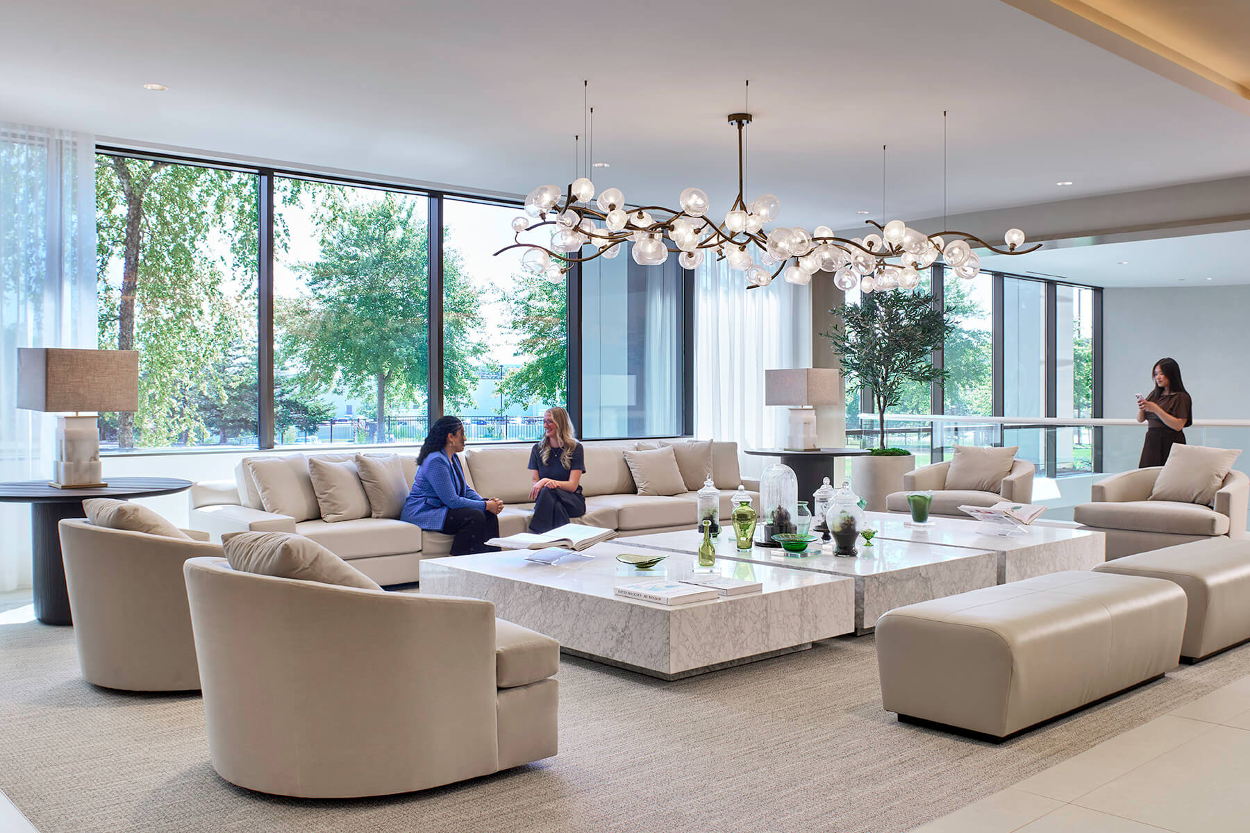 Soft couches and bright lobby seating.