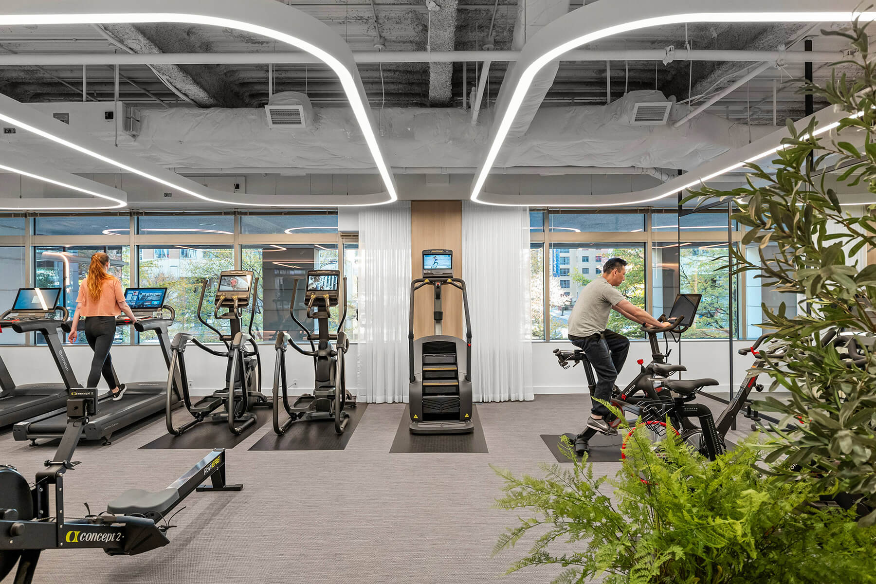 Wide view of the fitness center with a wide range of equipment.