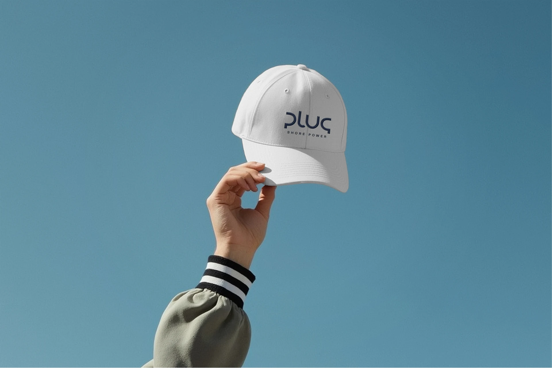 White cap with the Plug logo
