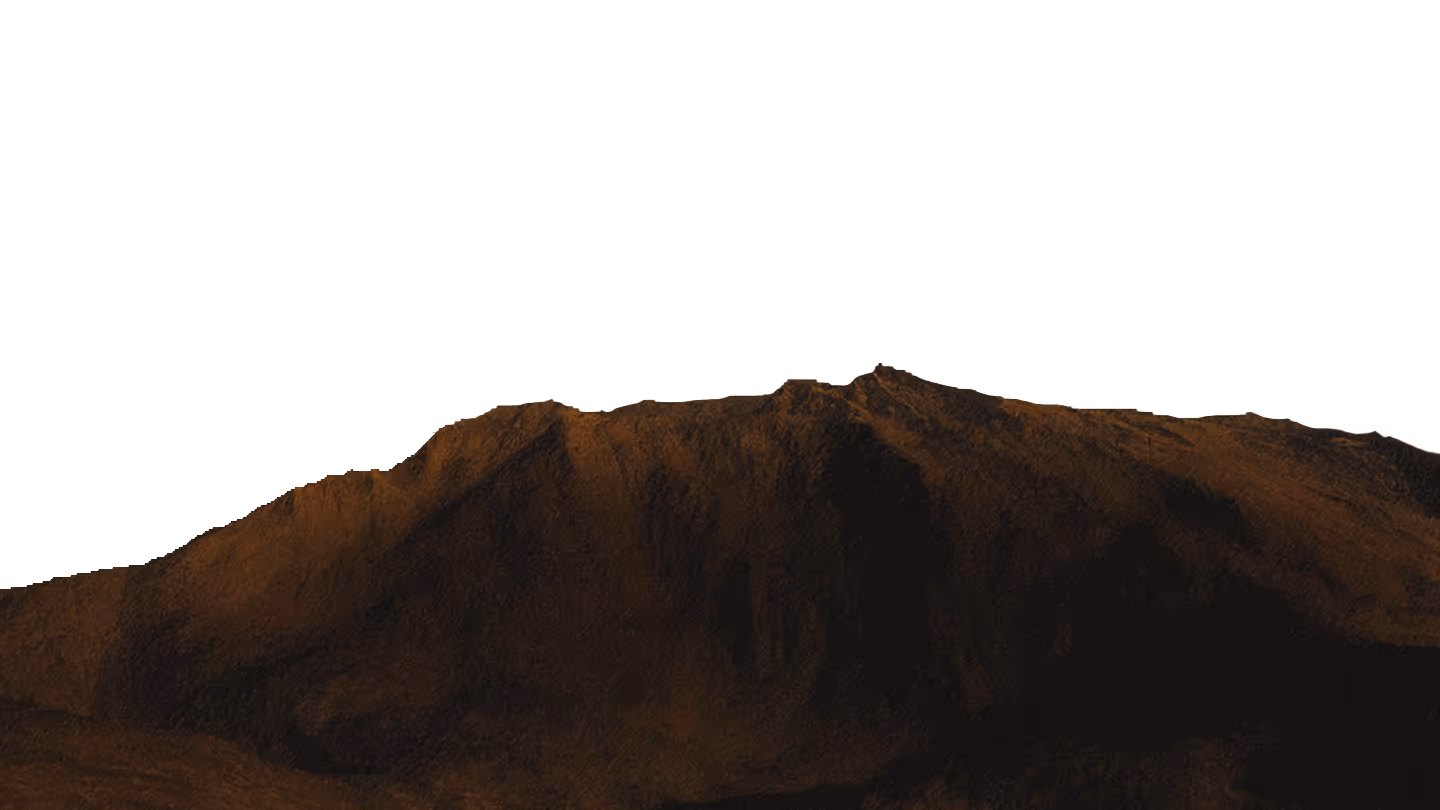 Faint, distant rock formations silhouetted against the celestial background.
