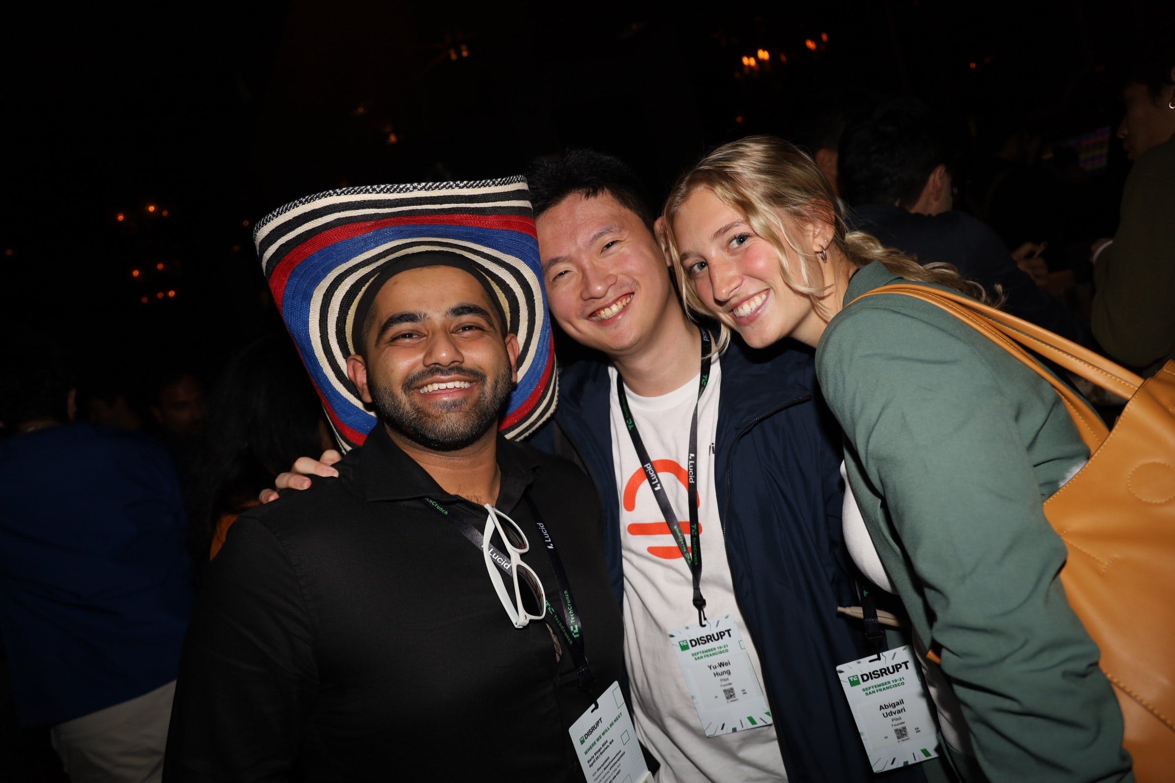 Three teammates at a Techcrunch Disrupt party