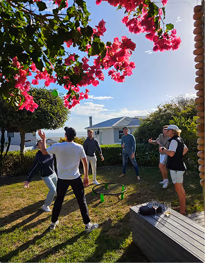 A group of modern dress college studies play a yard game during a fantasy drafts trip planned on Pilot. 