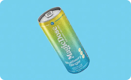 Magic Dose Blueberry Ginger can on a light blue background