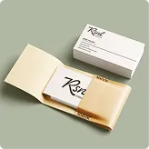 RSNL Creative business cards in a kraft paper sleeve