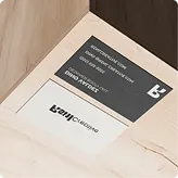 RSNL Creative business cards on a wooden desk