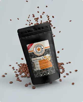 Black coffee bag packaging design with scattered coffee beans