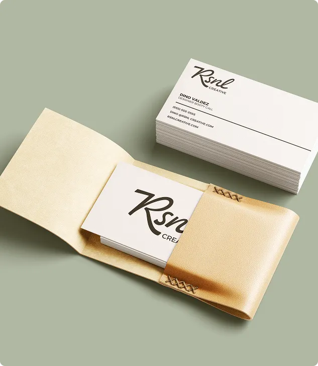 RSNL Creative business cards in a kraft paper sleeve