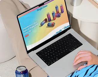 Person browsing the Magic Dose website on a laptop