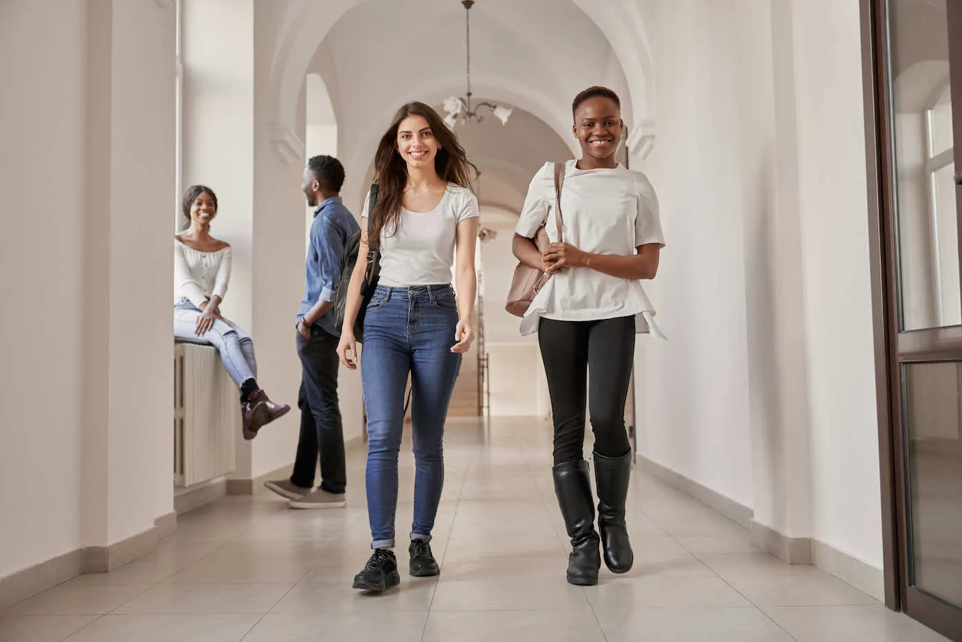 african-and-caucasian-students-girls
