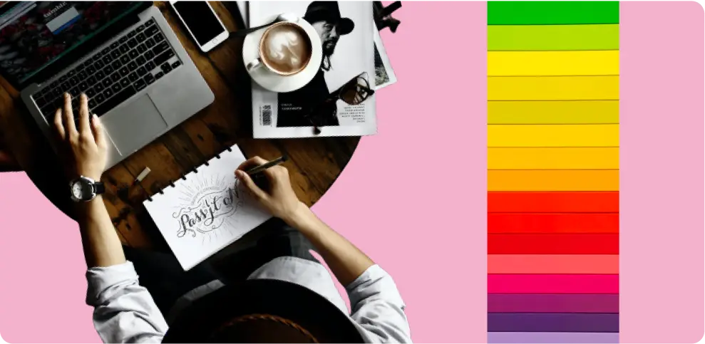 graphic designer working on type with colorful background