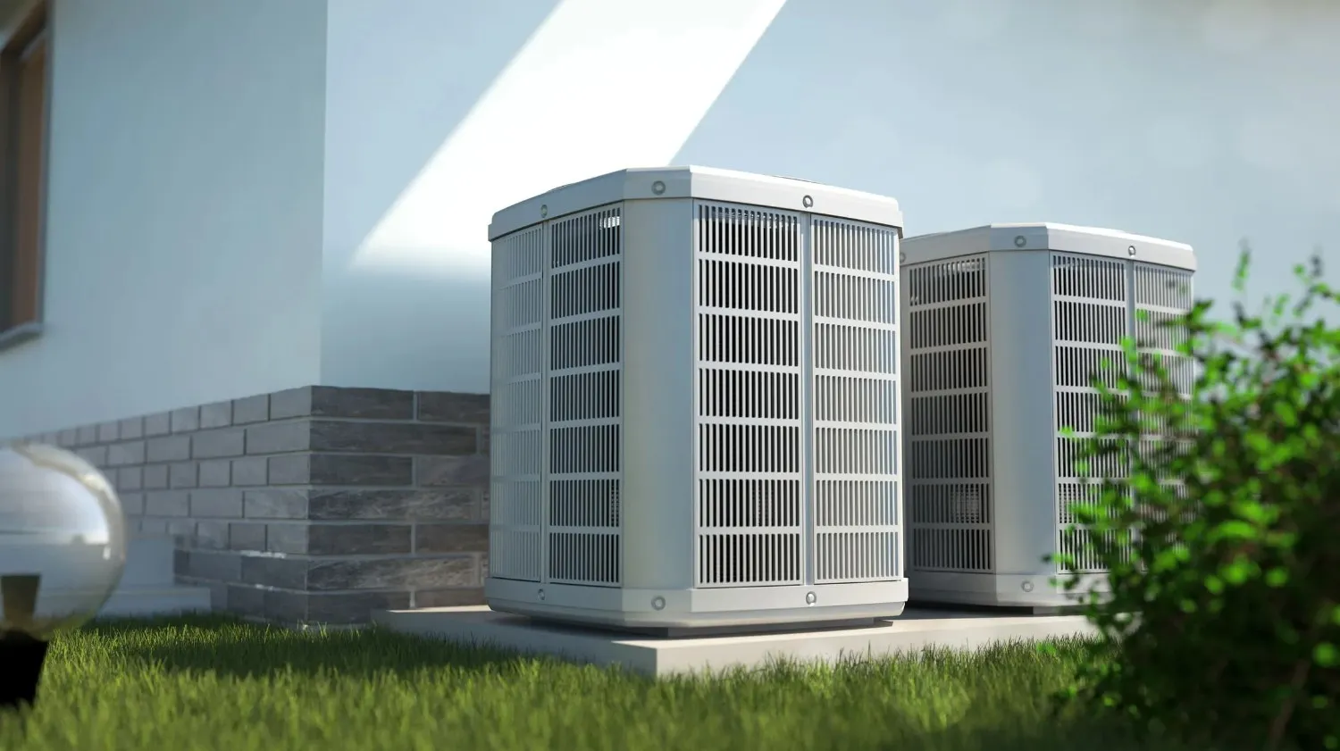 Two outdoor AC systems installed outside of a home