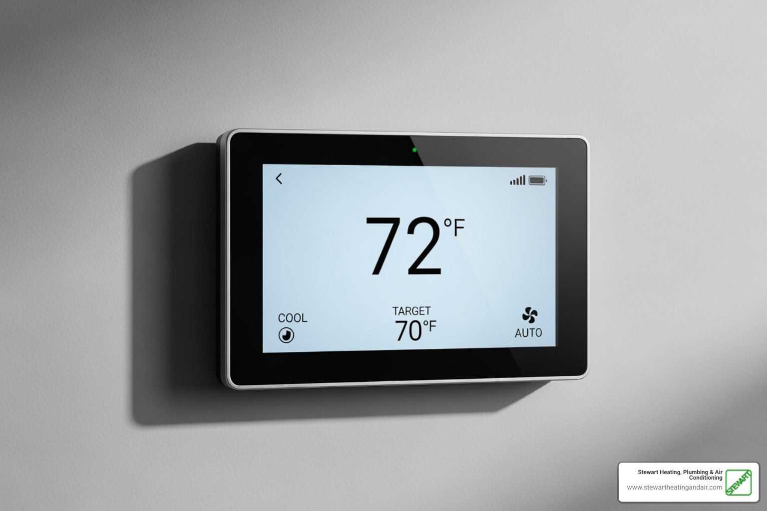 modern digital thermostat display - heater blowing cold air