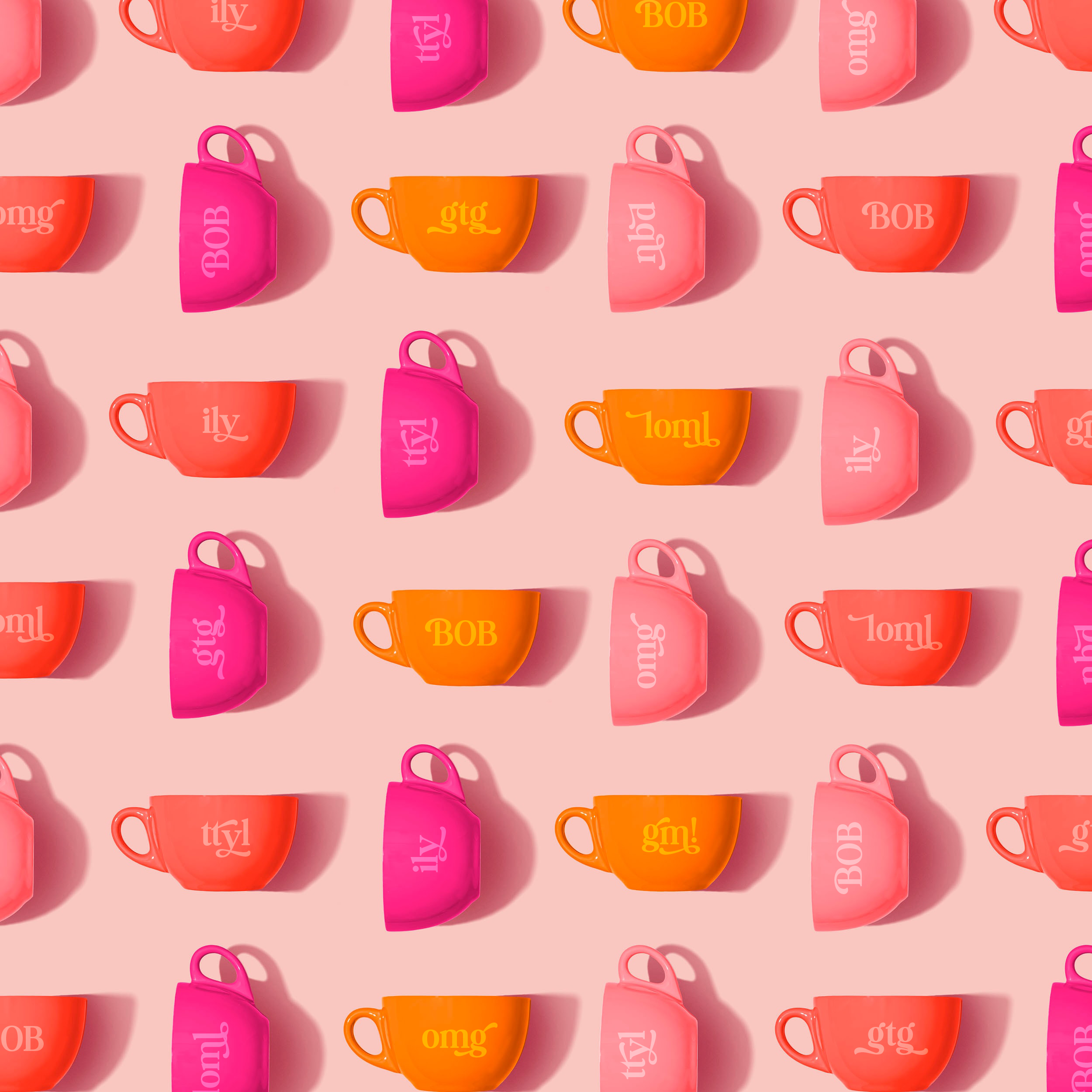 This is an image of a grid of coffee mugs laid on their side with different acronyms printed onto them. The background is pink, and all of the mugs are in various shades of pink and orange. Some of the messages are: "gtg" "loml" "gm!" "BOB" "ttyl" "ily".