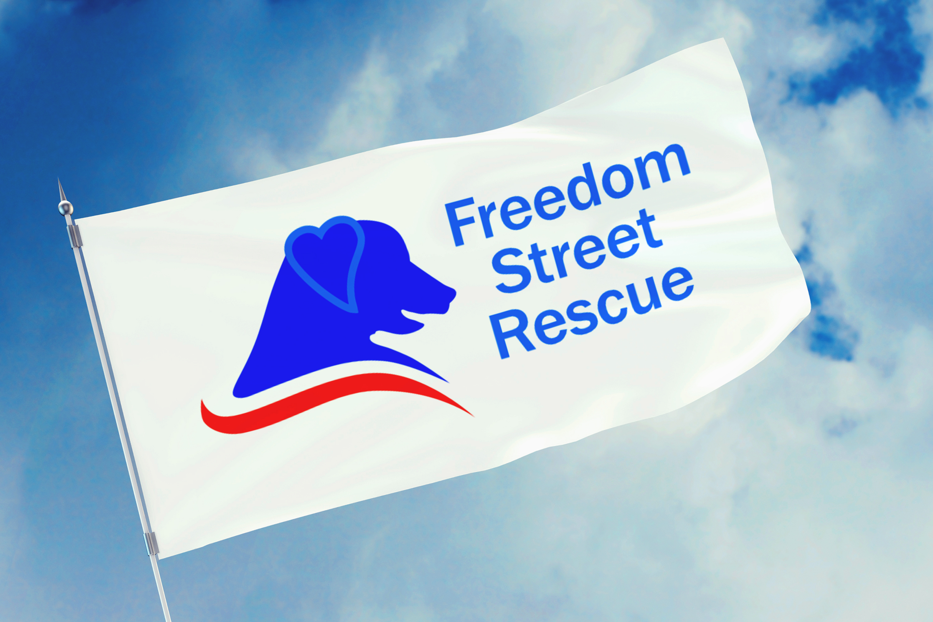This is an image of the freedom street logo on a white flag, with a blue sky with clouds in the background. The logo icon features the profile silhouette of a dog (in royal blue) with a red stripe following the collar of the dog, creating the illusion that there is a street trailing off the dog.