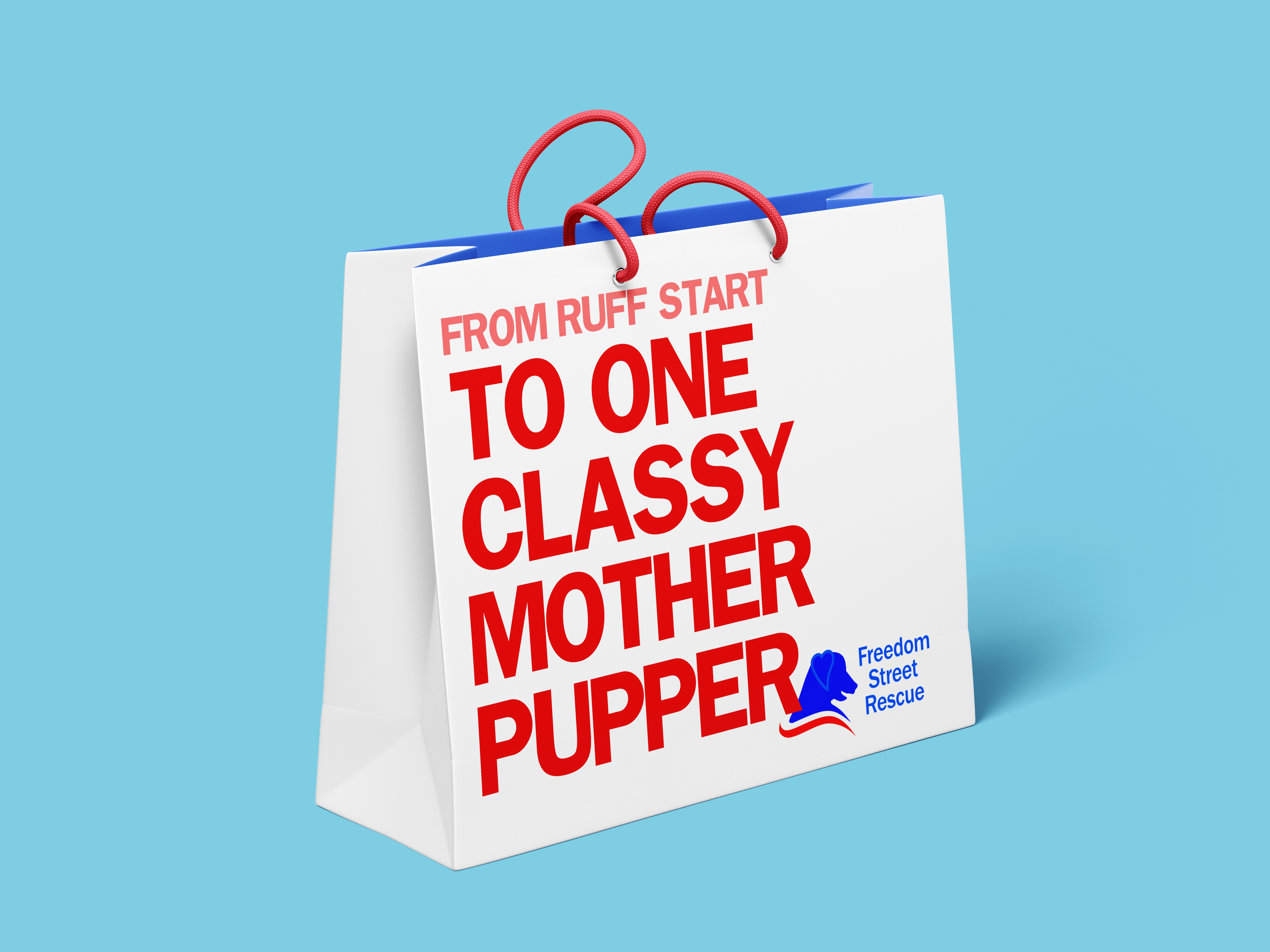 A white gift bag for Freedom Street Rescue on a bright, light blue background with the message in bold, red type reading "from ruff start TO ONE CLASSY MOTHER PUPPER"