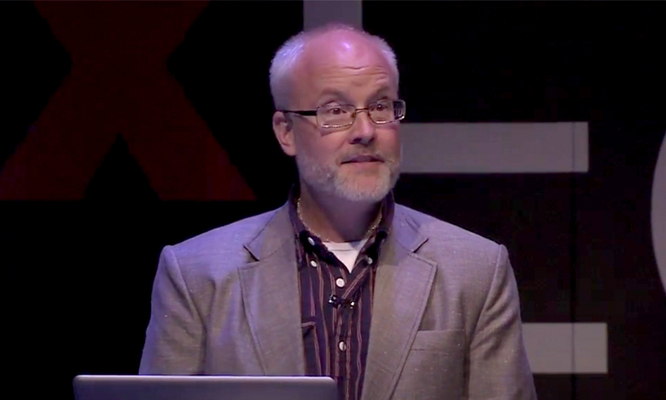 Picture of Law Alsobrook in a taupe colored blazer.