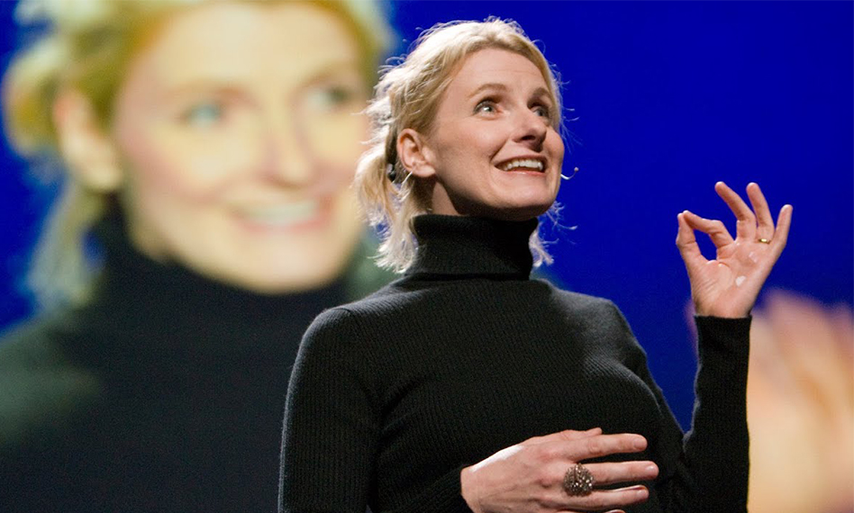 Picture of a blond woman in a black turtleneck. Not Elizabeth Holmes, but Elizabeth Gilbert. 