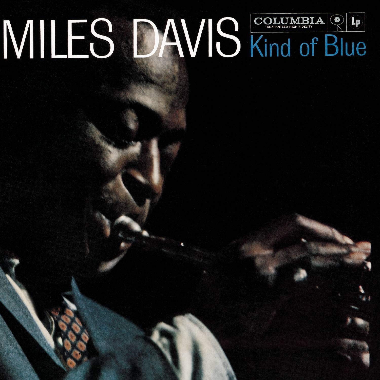 Album cover of "Kind of Blue" by Miles Davis. Features a close up image of Miles playing the trumpet.