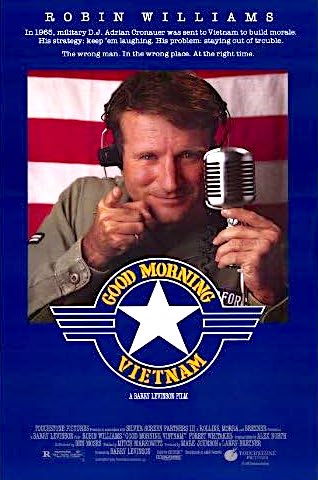 Movie poster for "Good Morning Vietnam" featuring Robin Williams in a military outfit holding a vintage microphone and pointing at the viewer. The poster is royal blue and Robin Williams is set against an American flag.