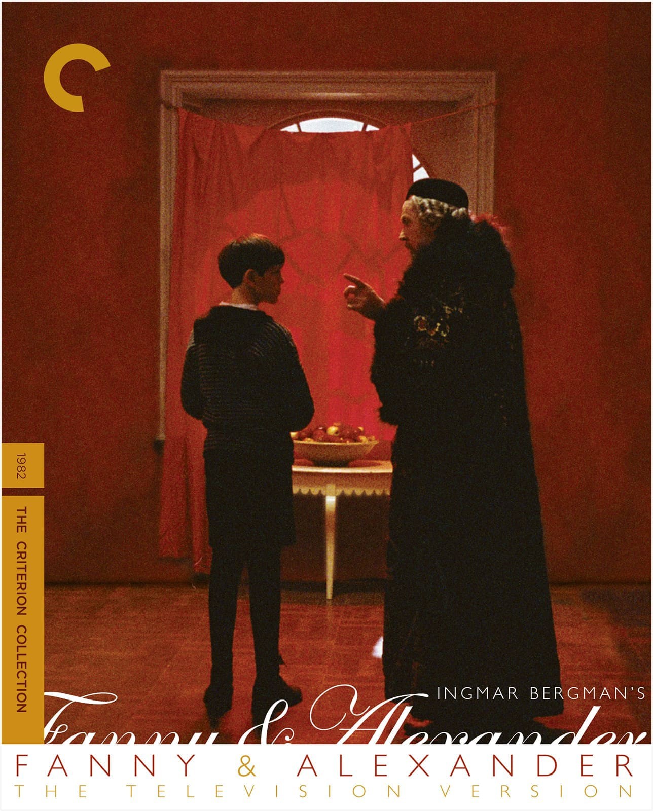 Movie poster for "Fanny & Alexander". A young prince and a wizened, enrobed, king are centered against a red wall, red floor, and window covered by a red cloth. The old man appears to be lecturing the boy.