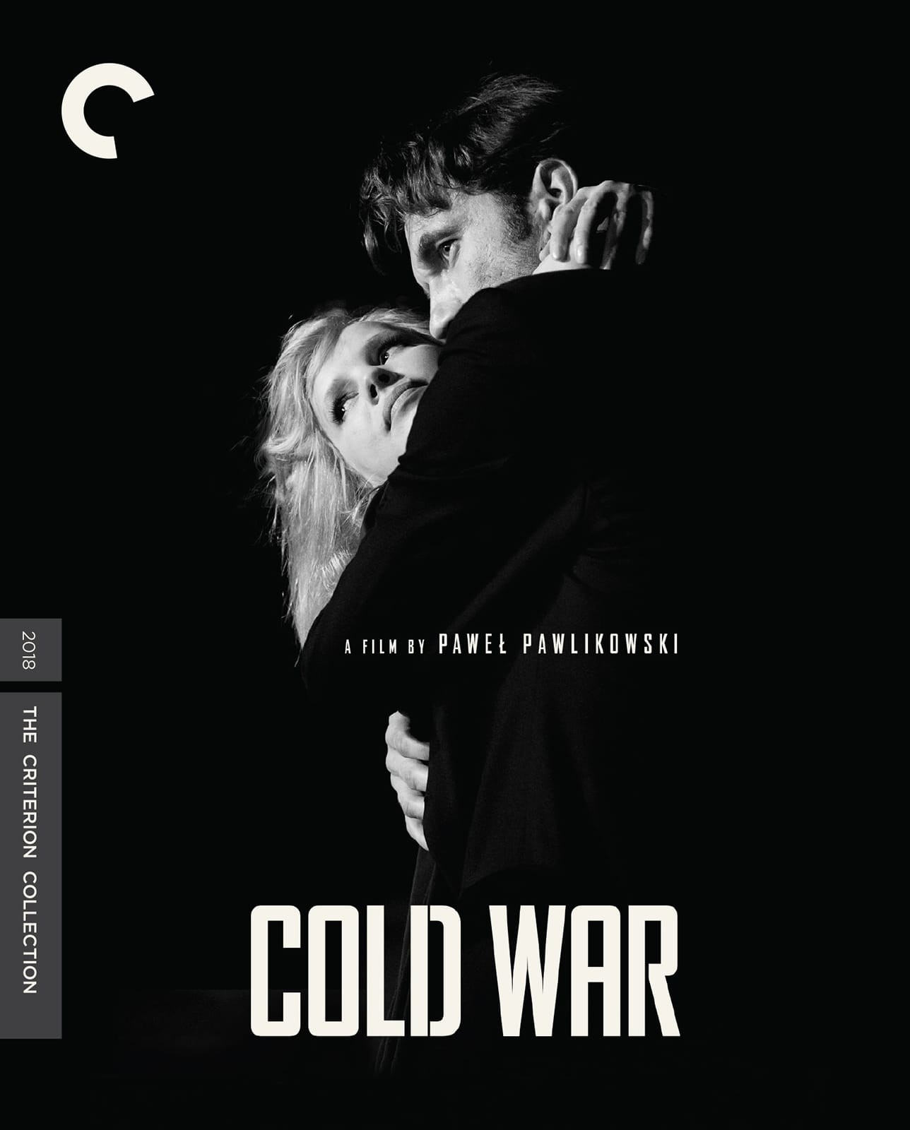 Movie poster for "Cold War" featuring a black and white image of two characters embracing in black coats, faces partially obscured. 