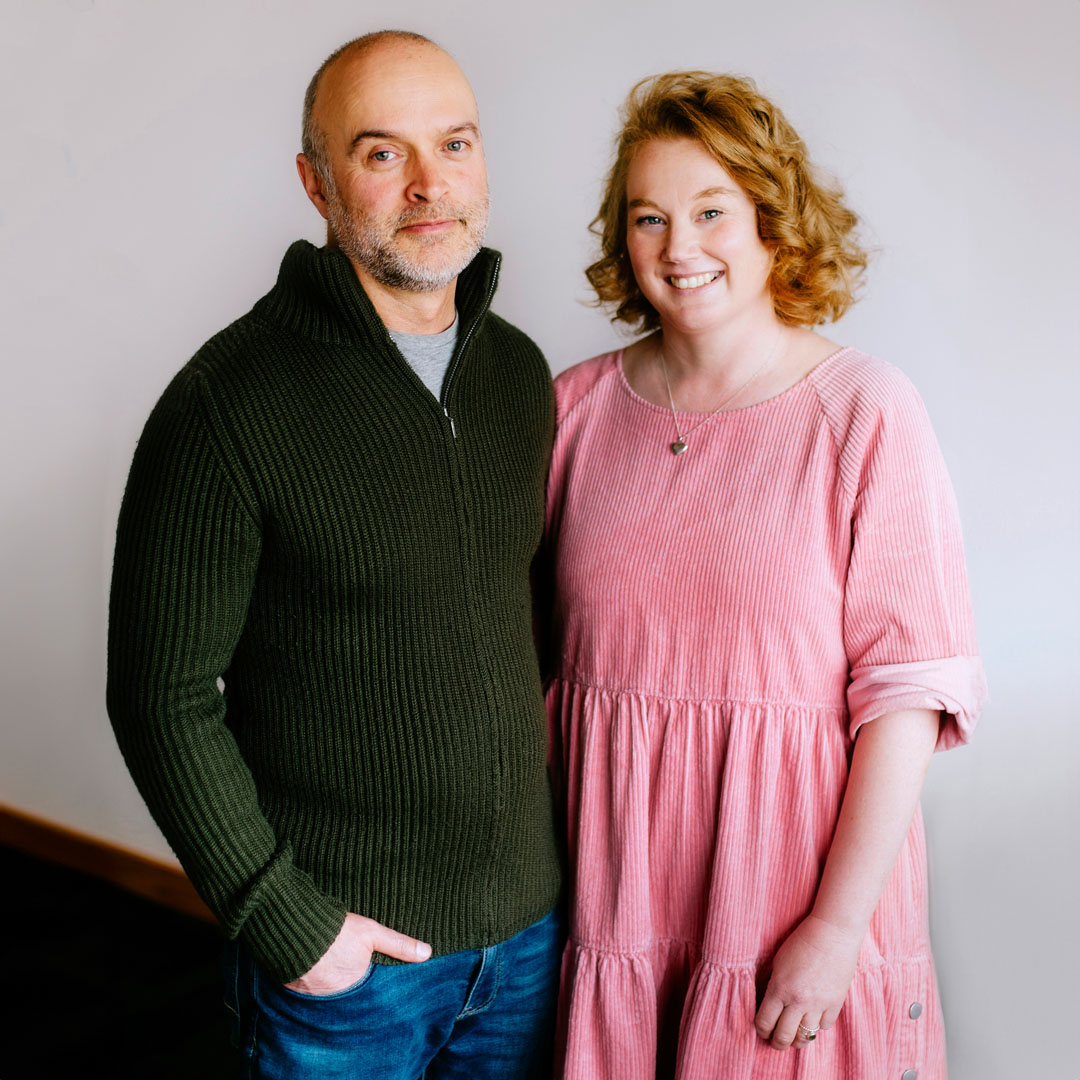 Pete and Bek standing together
