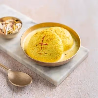 Rasmalai is a popular Bengali sweet delicacy made with Indian cottage cheese or chenna (paneer) discs cooked in sugar syrup.