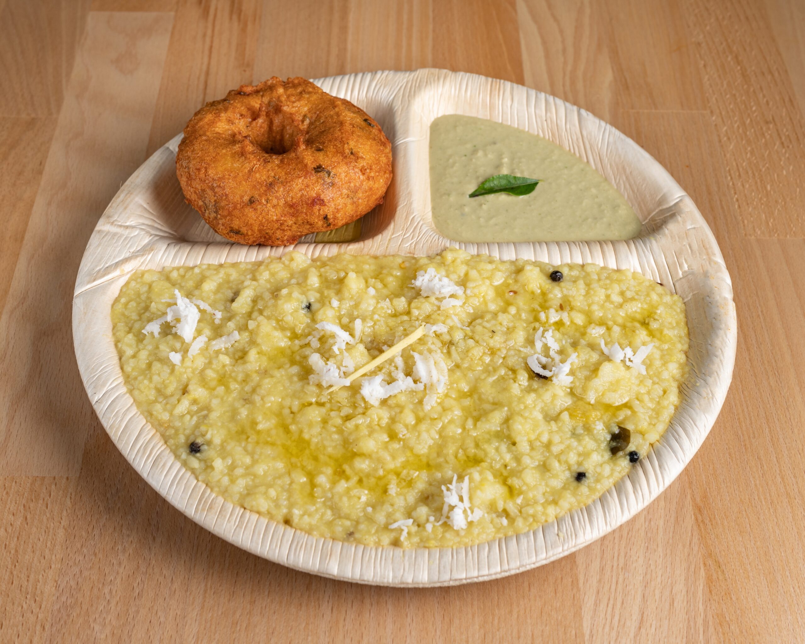 Pongal and Vada served with Coconut Chutney & Sambar.