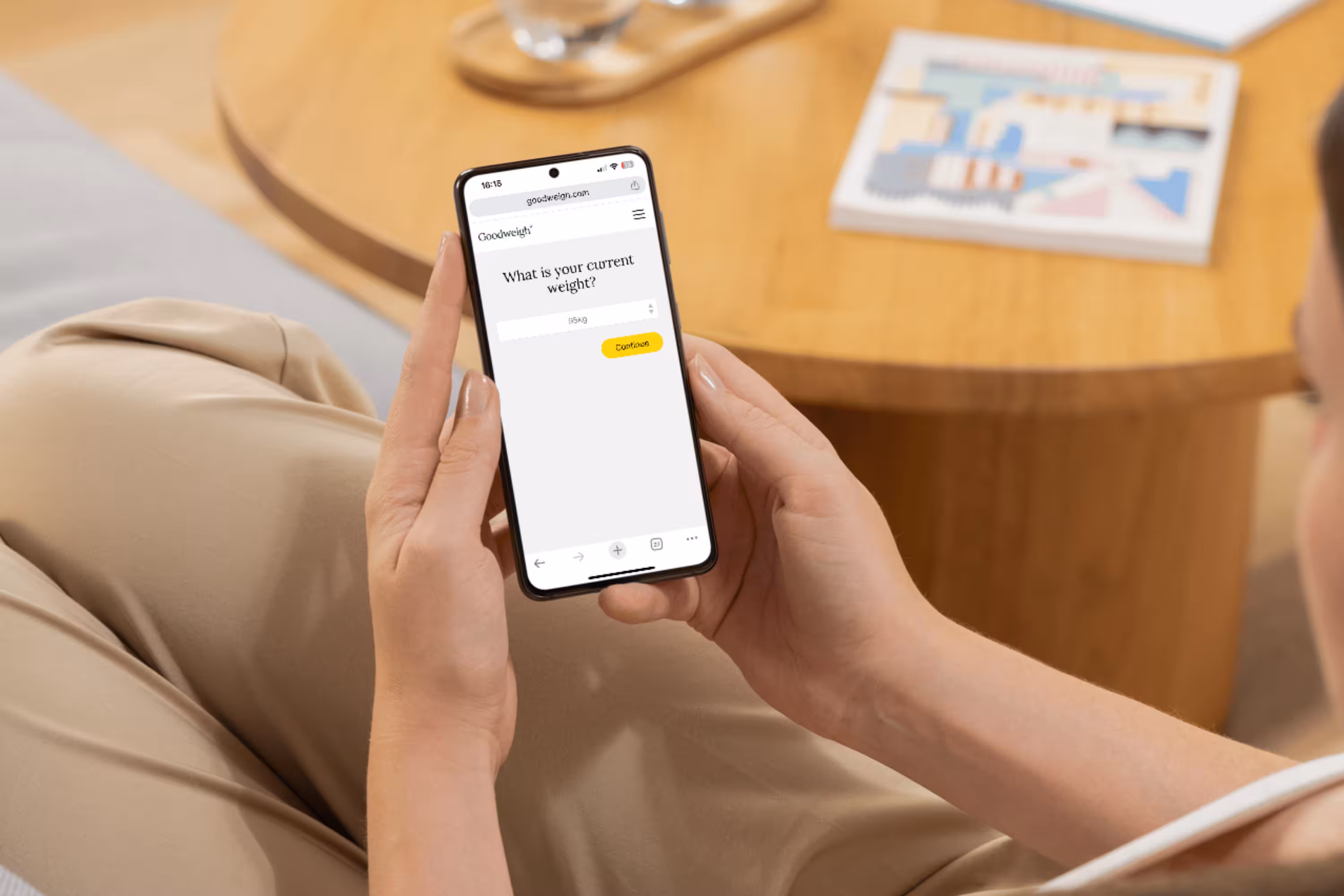 Woman fills out Goodweigh intakeform on phone