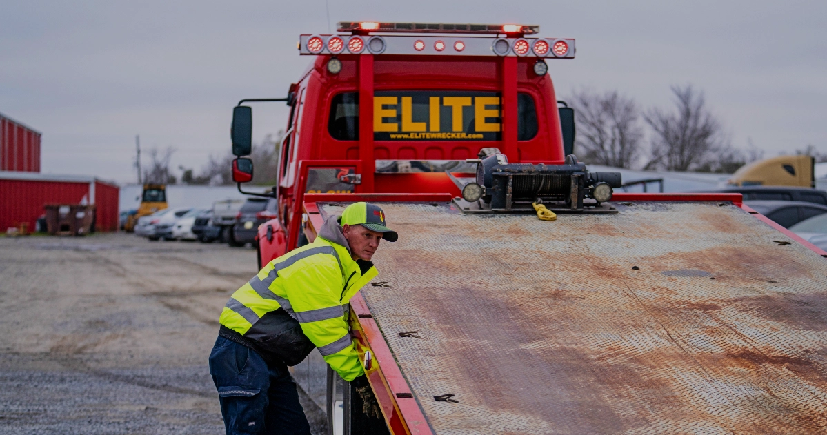 Tow Operator Preparing Rusted Flatbed Deck