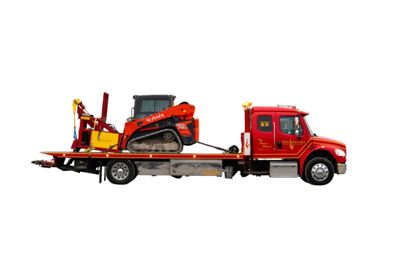 Flatbed Tow Truck Hauling Compact Track Loader