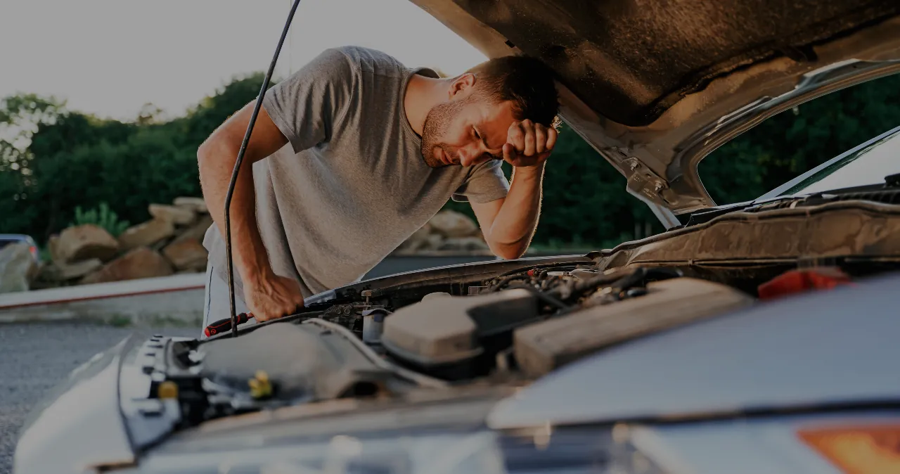 Driver Checking Serious Vehicle Mechanical Problems