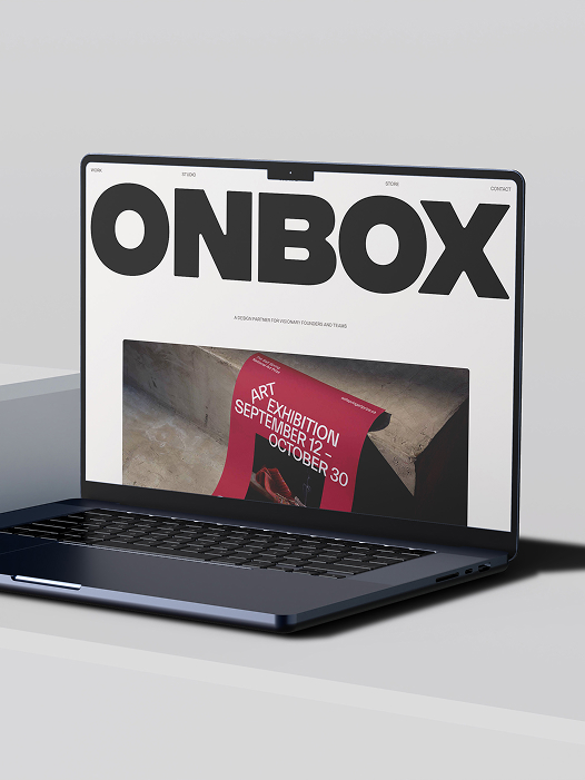 Laptop showing ONBOX website homepage