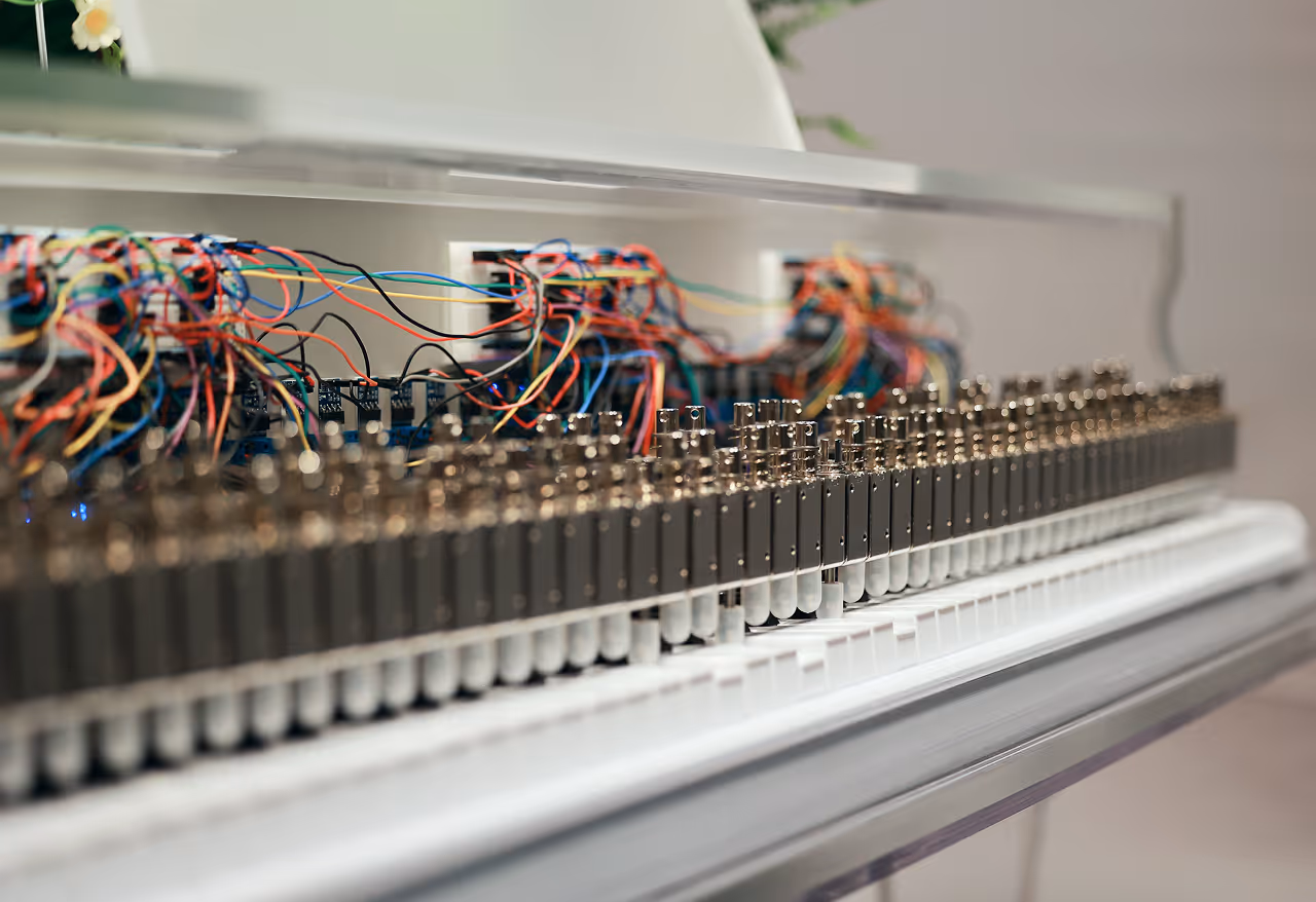 Photograph of the Plant Pianist interactive installation, capturing its physical presence and real-world configuration.