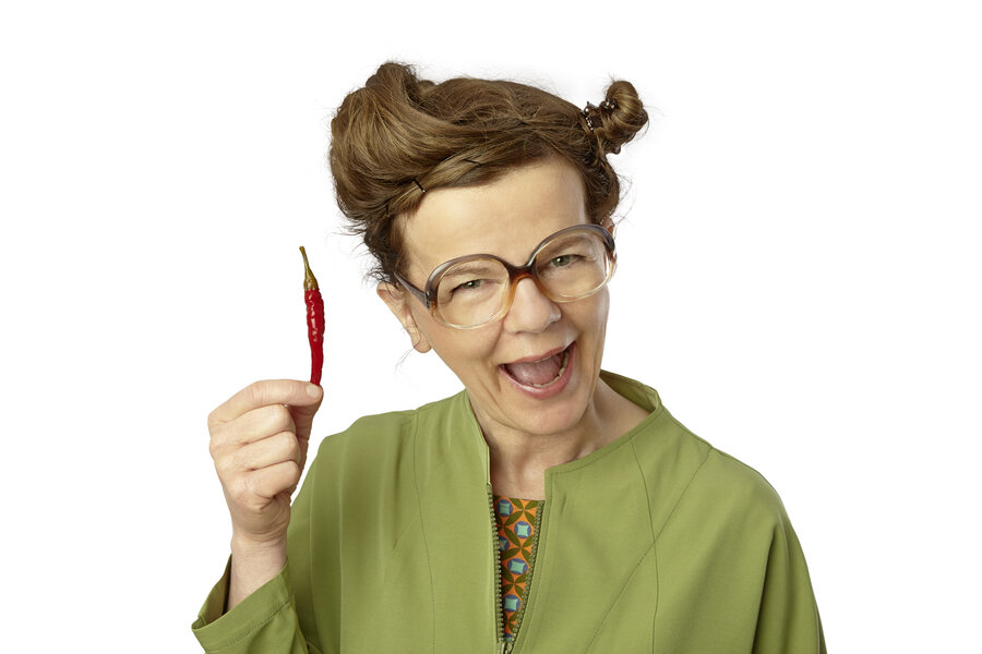 Bild vergrößern: Frau mit Chilischote