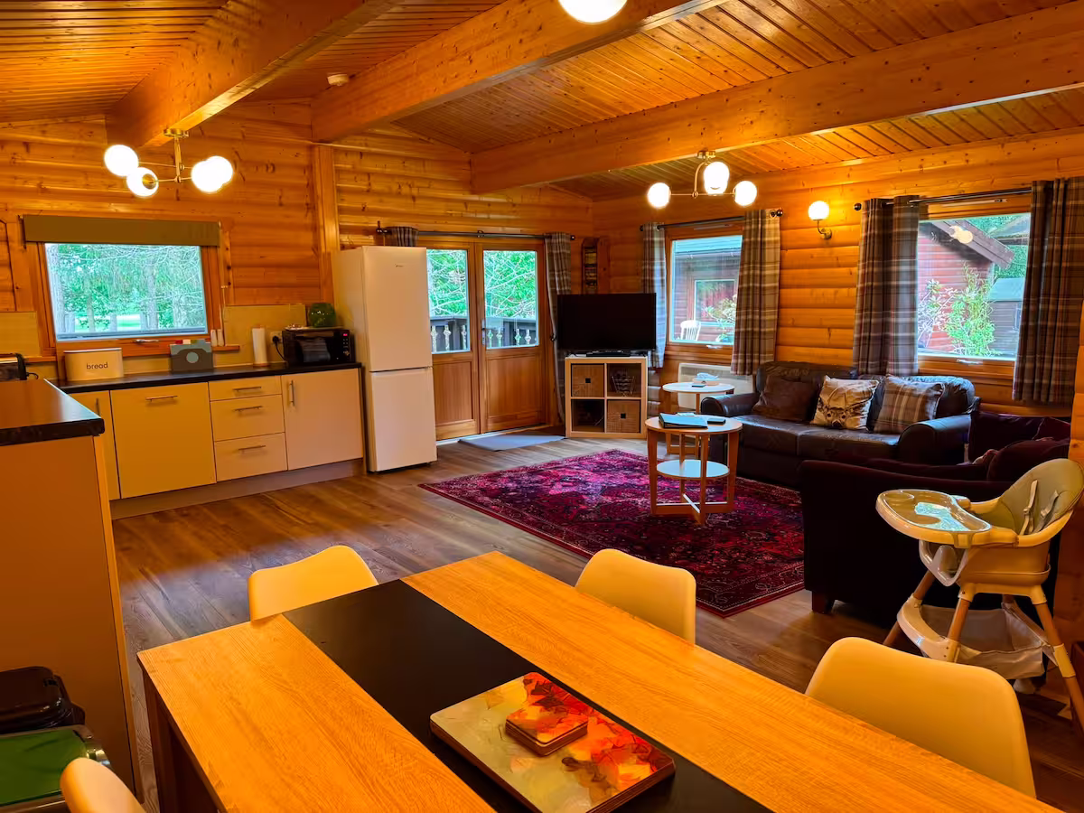 The lounge, kitchen and dining room inside of the George Lodge