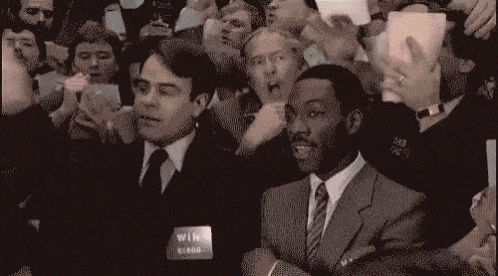 A scene showing commodities futures trading from the 1983 movie Trading Places.