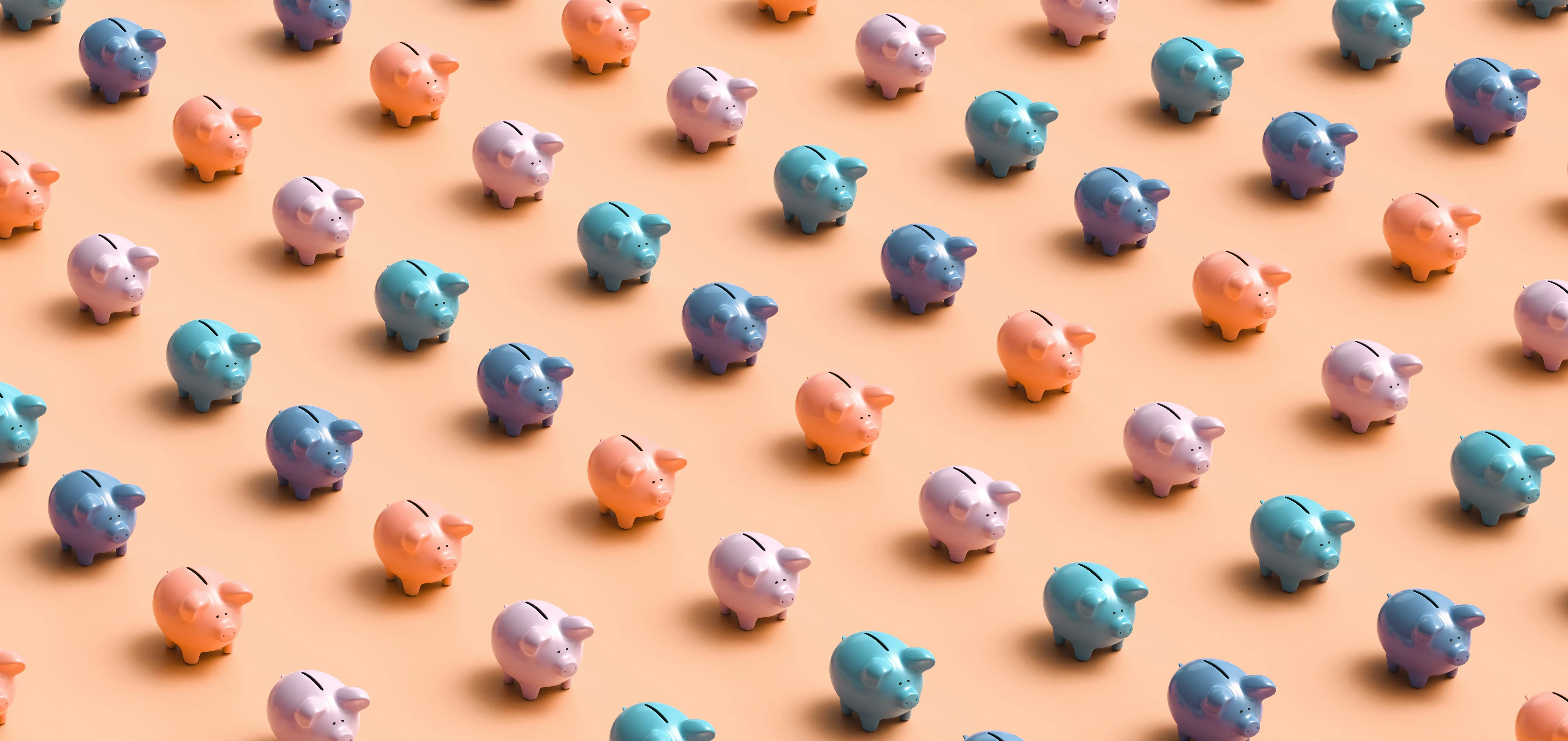 Rangées de tirelires cochon colorées sur fond orange