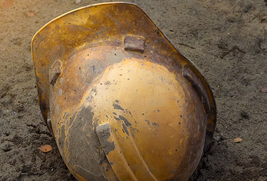 A used and discoloured hard hat