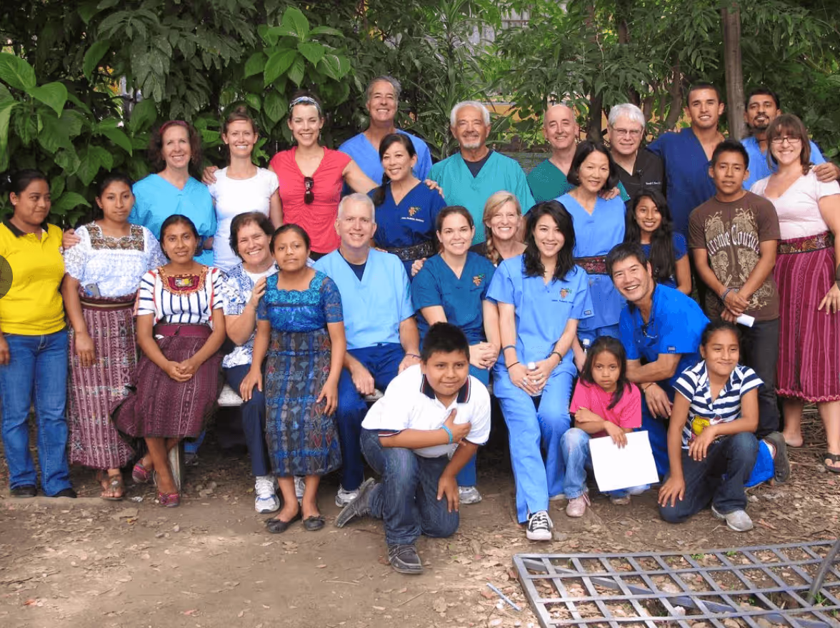 A group of people posing for a picture.