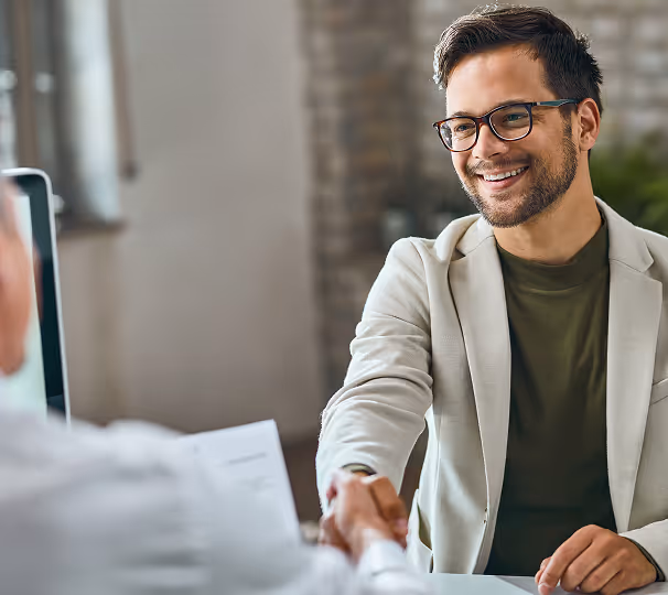 Handshake between two people depicting a successful interview