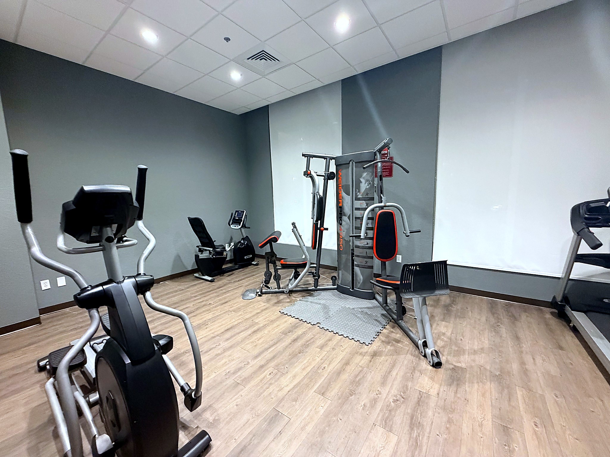 Gym weight machine and stationary bike