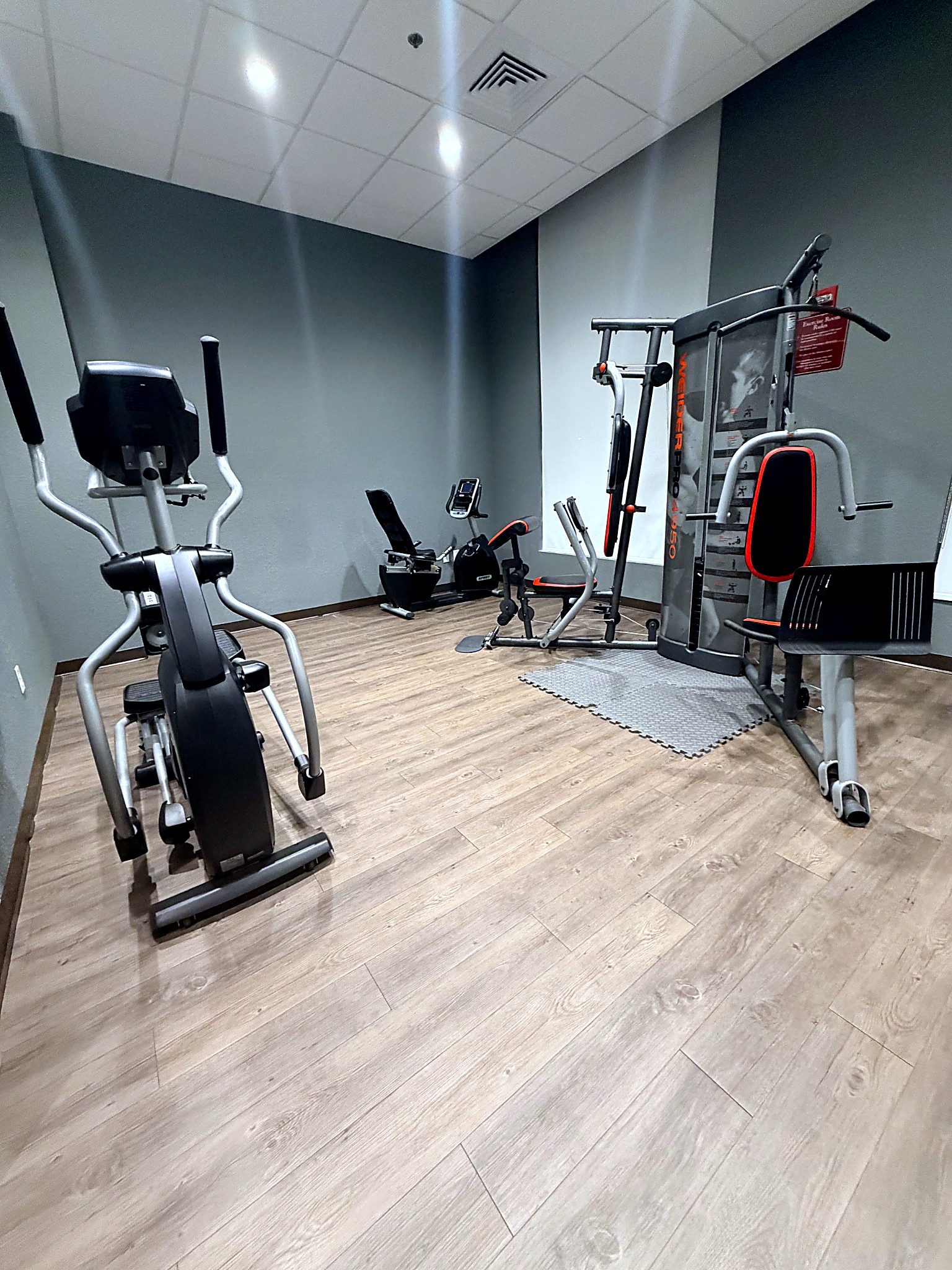 Gym weight machine and stationary bike