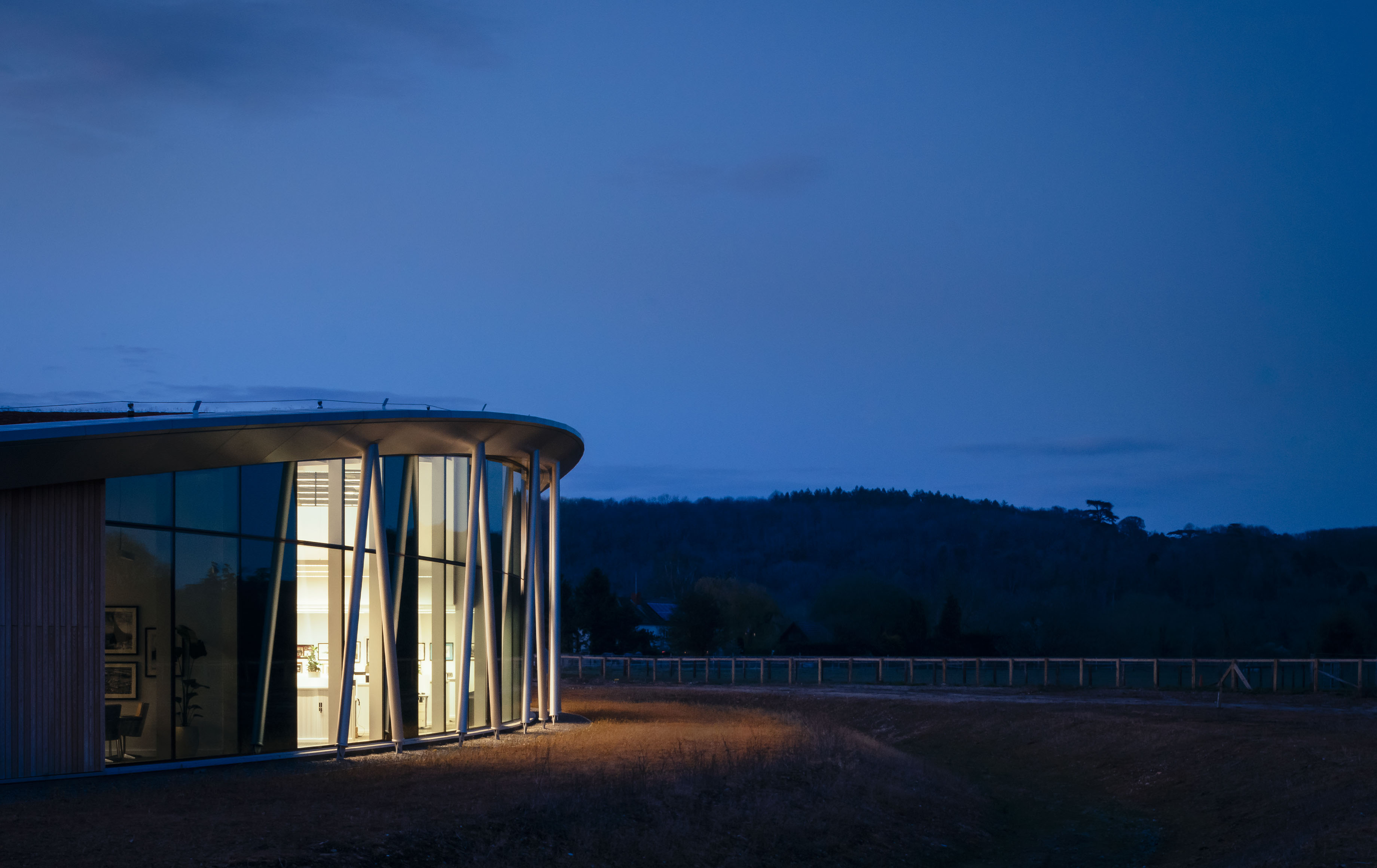 The Wing - Bremont project, a dusk scene with an internally illuminated facade.