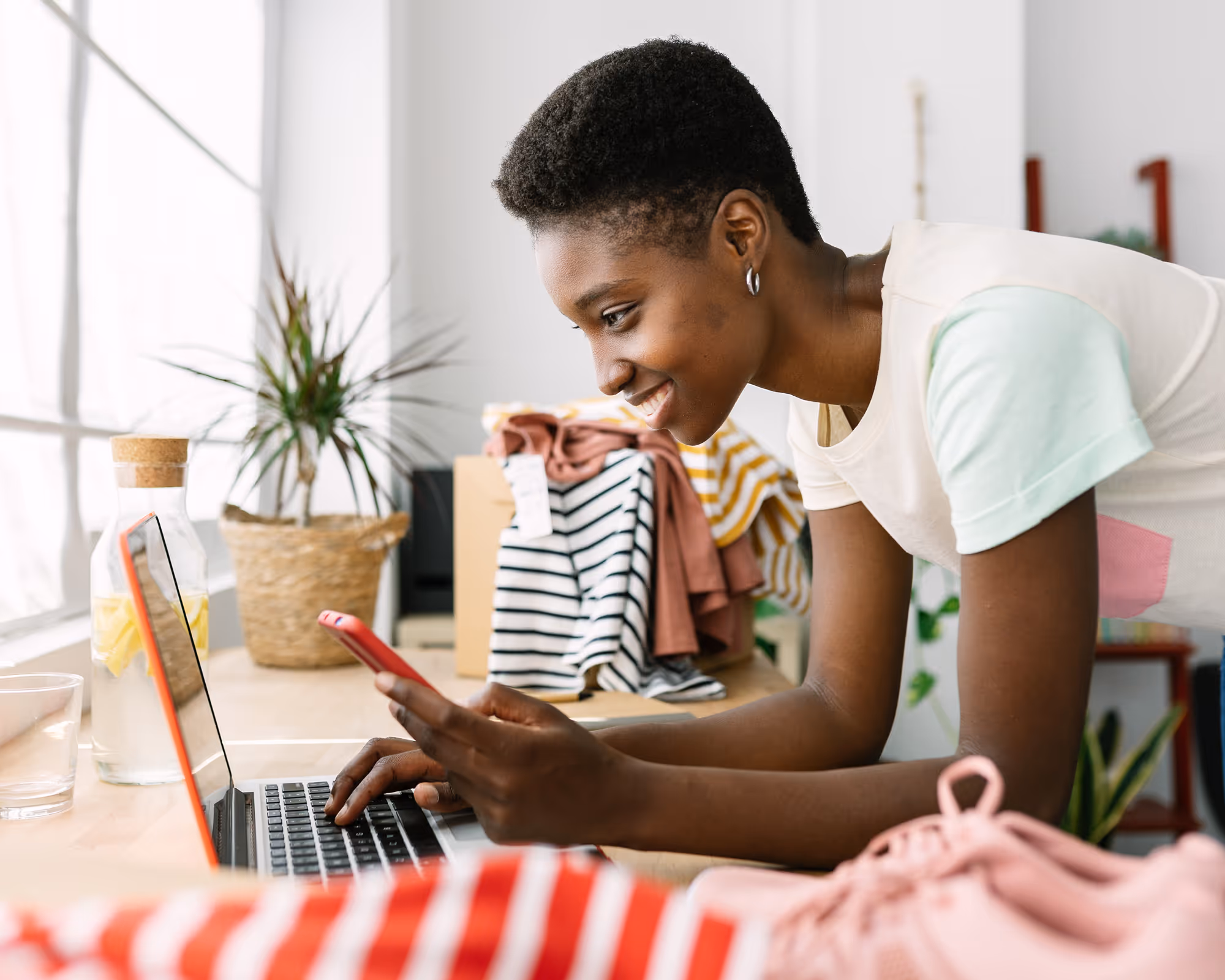 Image of woman making an online purchase.
